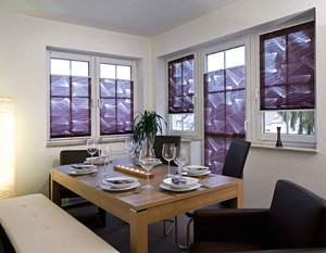 Tende plissettate a motivi e colori